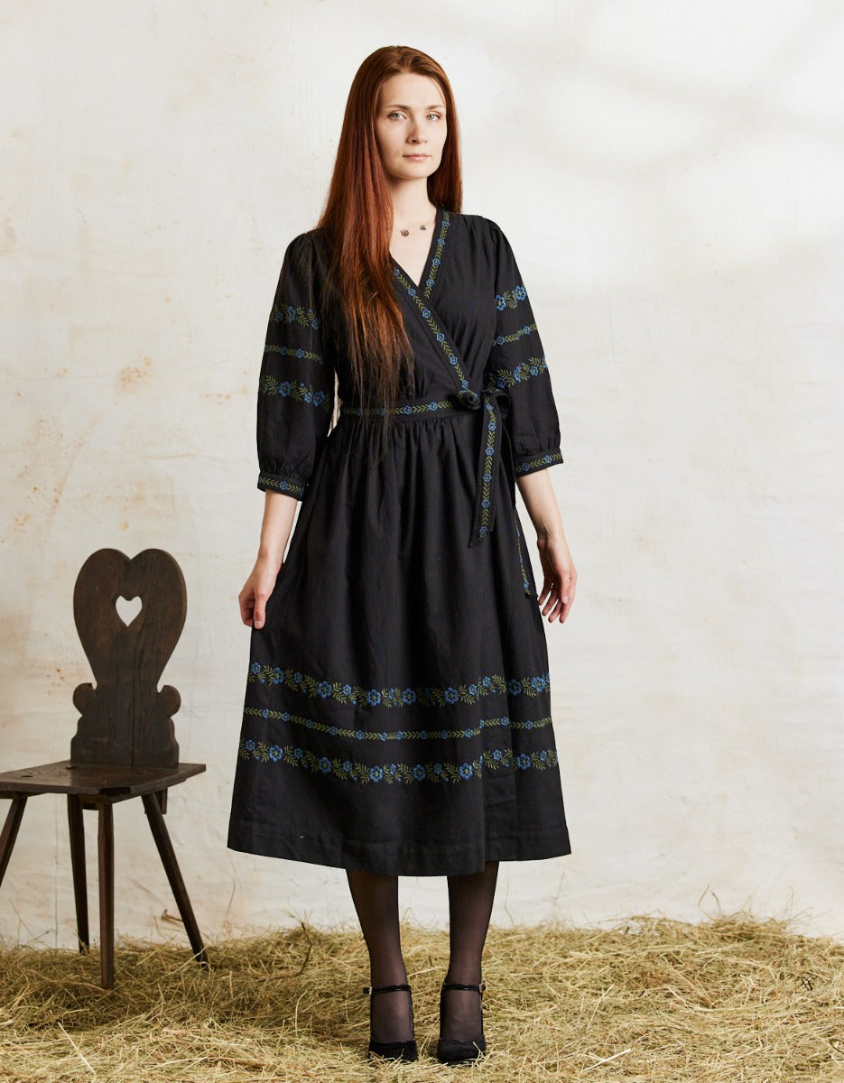 Tabea embroidered Black crossover dress with blue flowers