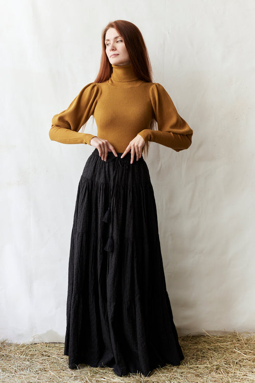 Pull col roulé 'Ariana' en coton et cachemire avec manches gigot moutarde