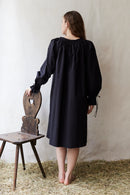 "Cosima" black shift dress with long sleeves