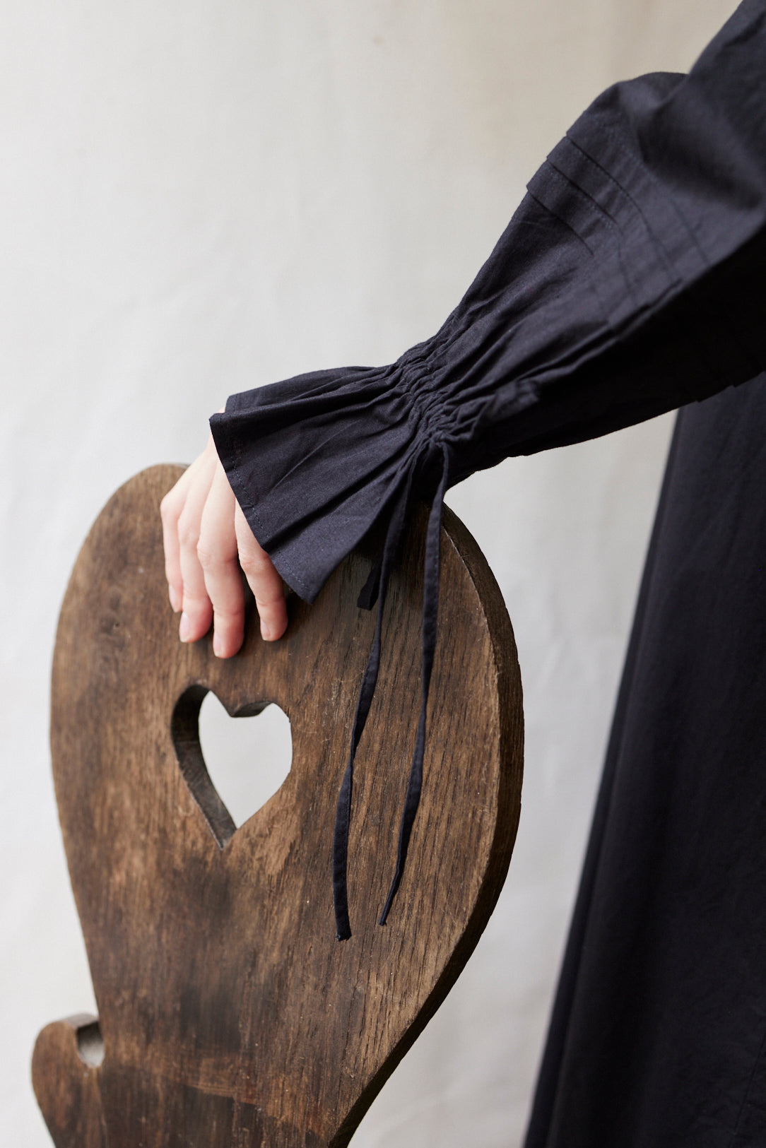 "Cosima" black shift dress with long sleeves
