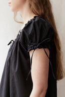 "Cosima" black shift dress with short sleeves