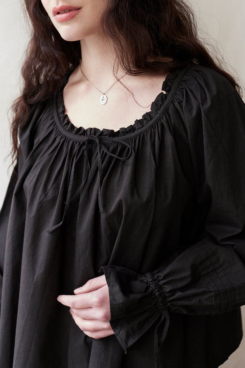 "Cosima" black top with long sleeves