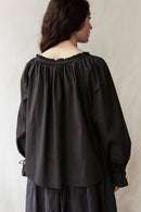 "Cosima" black top with long sleeves