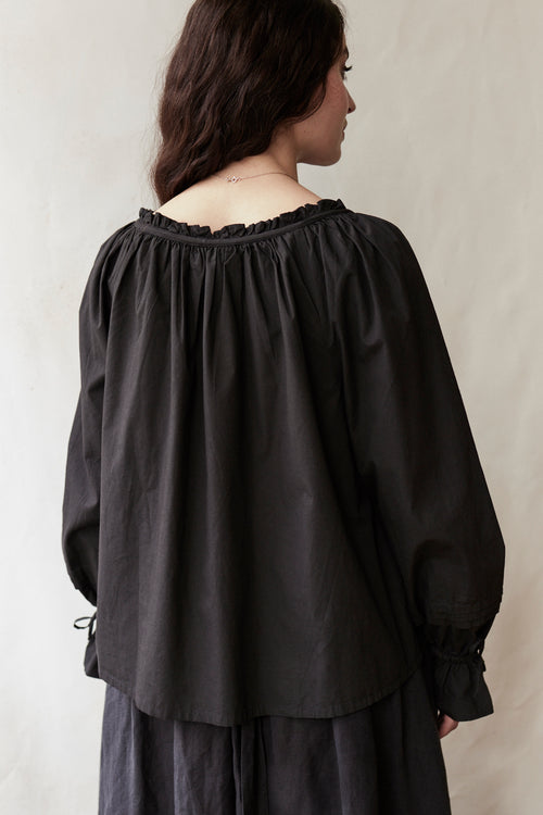 "Cosima" black top with long sleeves