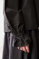"Cosima" black top with long sleeves
