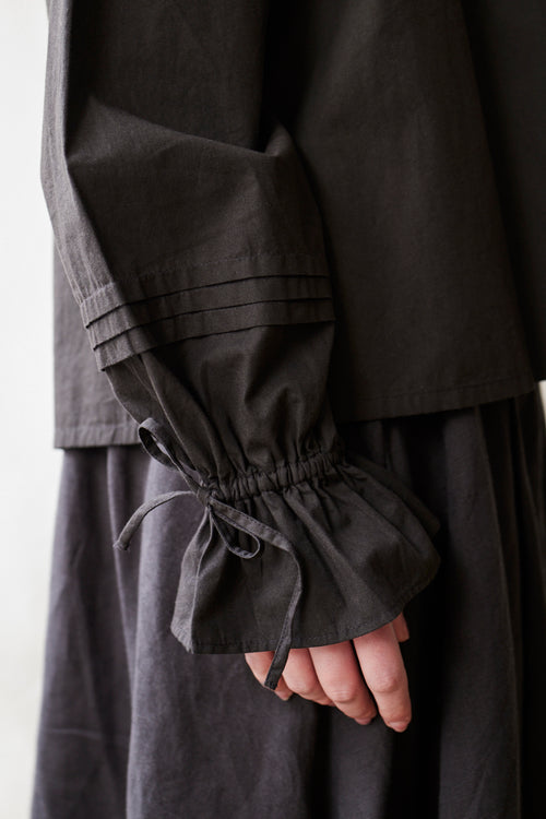 "Cosima" black top with long sleeves