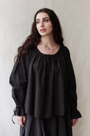 "Cosima" black top with long sleeves