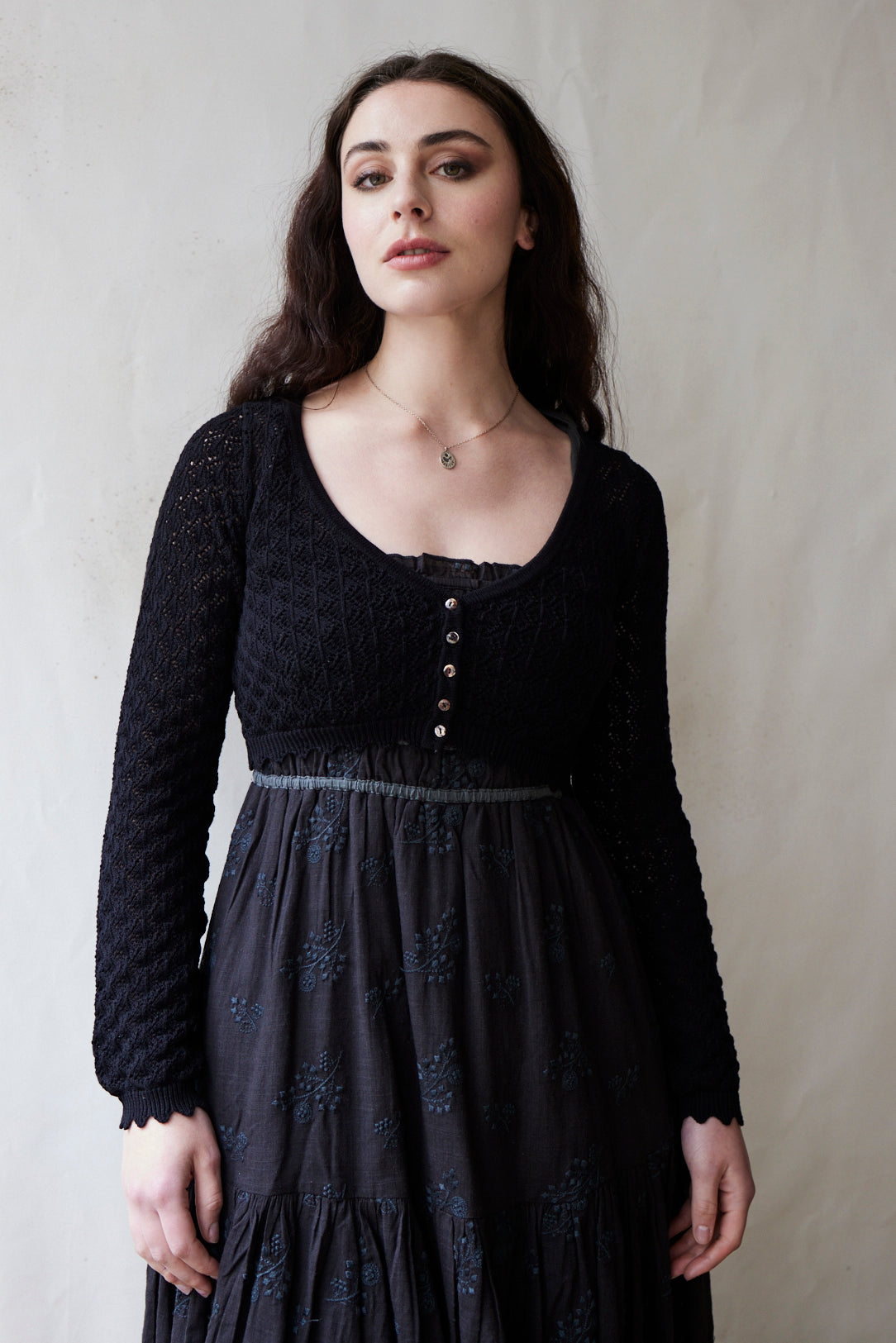 "Mona" cropped lace cardigan in black cotton, long sleeves