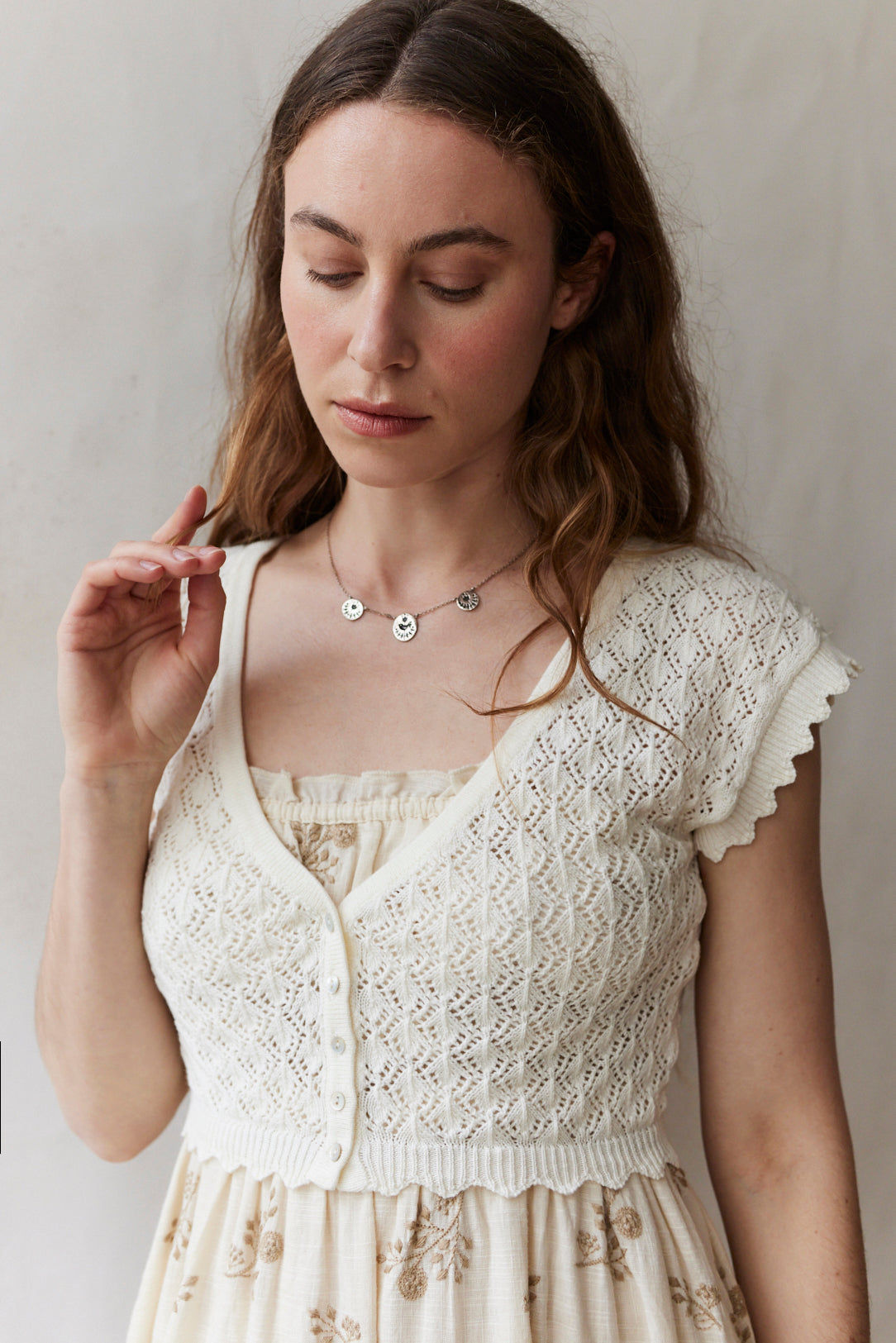 "Mona" cropped lace cardigan in cream cotton