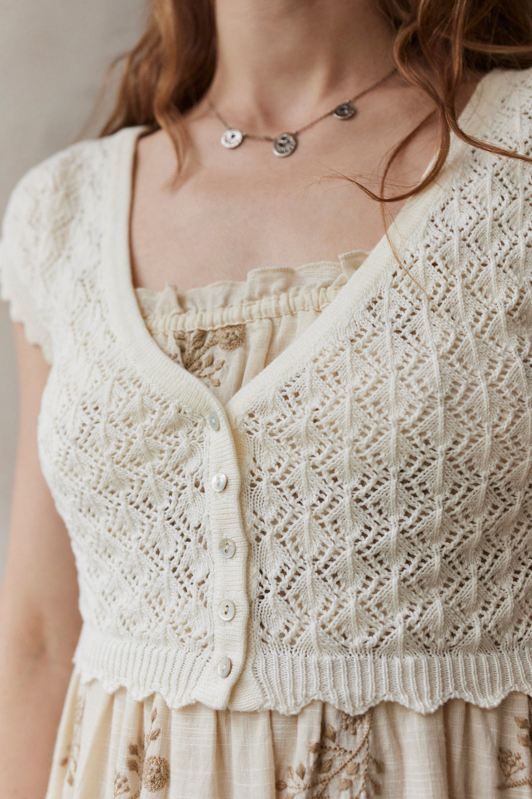 "Mona" cropped lace cardigan in cream cotton