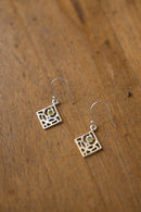 Boucles d'oreille "Primula major" en argent et péridot