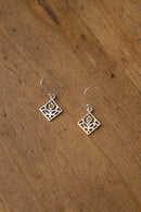 Boucles d'oreille "Primula major" en argent et péridot
