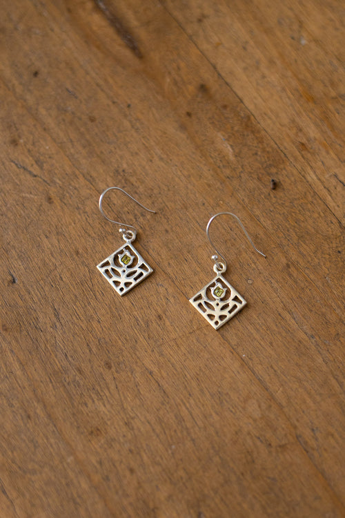 Boucles d'oreille "Primula major" en argent et péridot