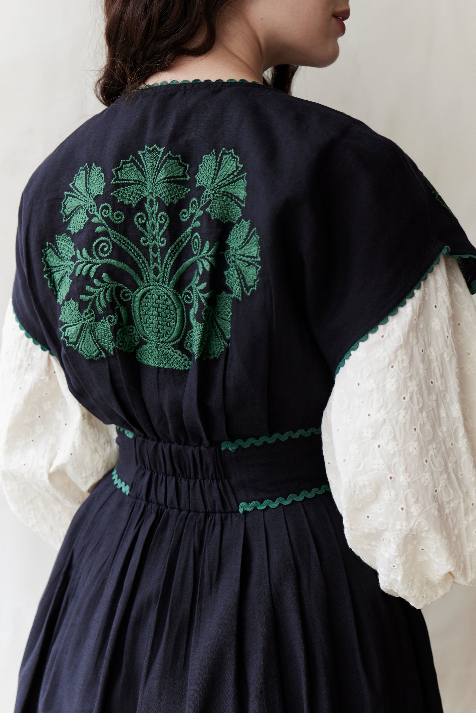 "Vivika" black dress with green embroideries