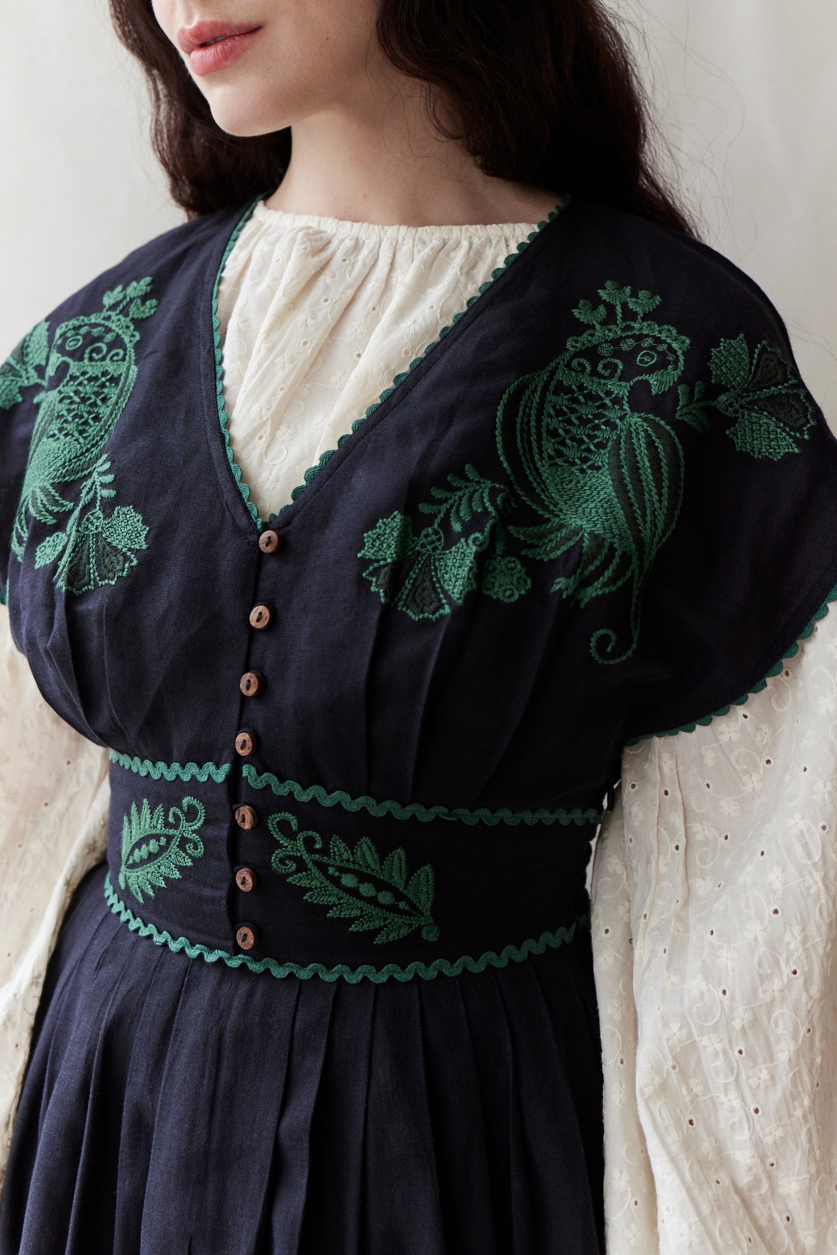 "Vivika" black dress with green embroideries