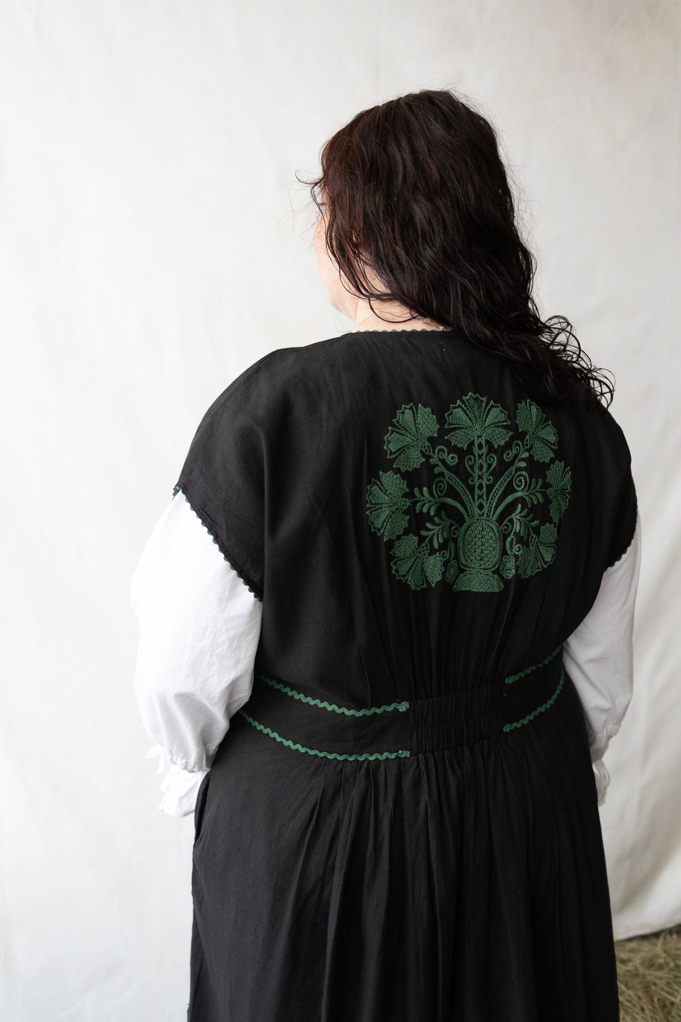 "Vivika" black dress with green embroideries