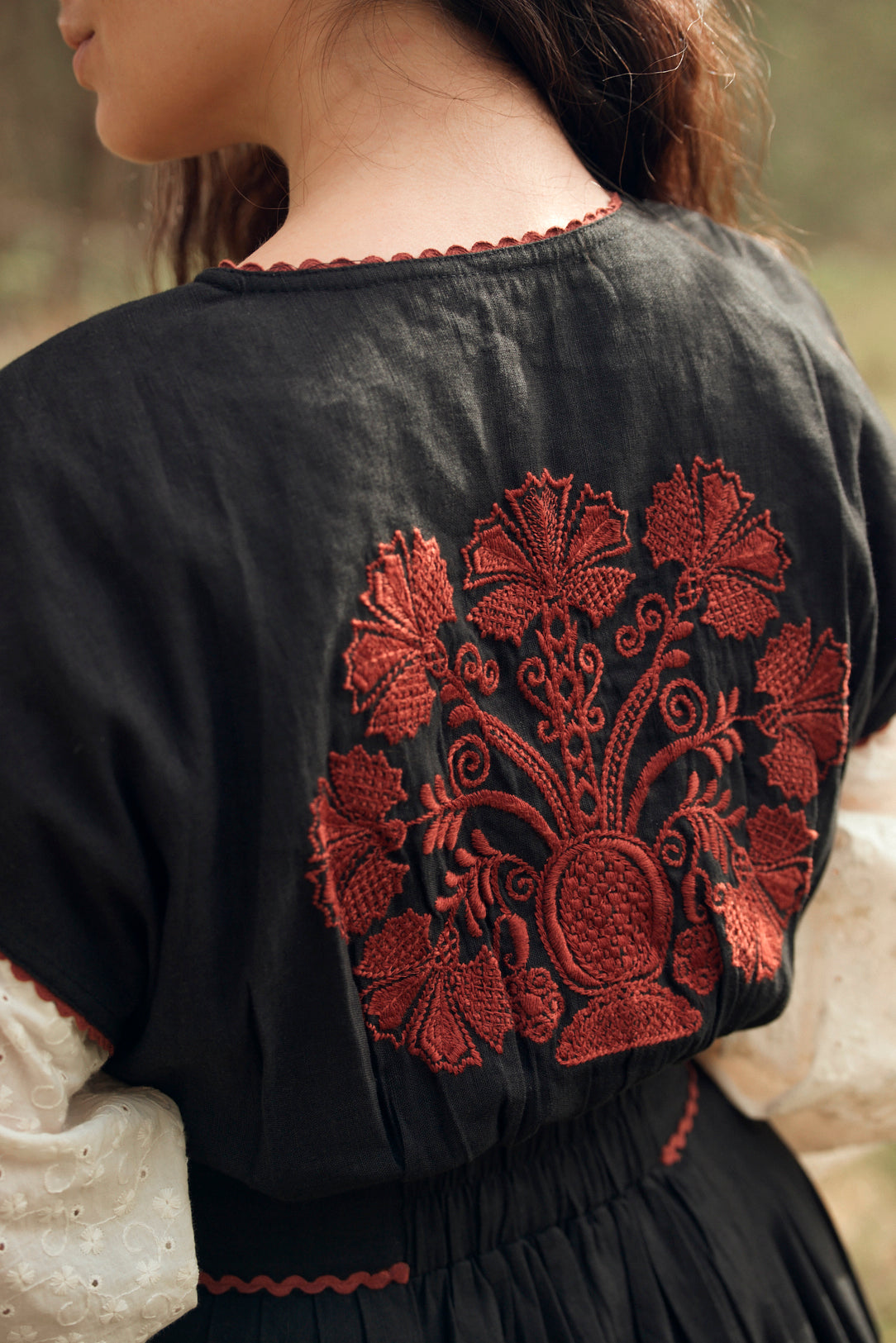 "Vivika" black dress with red embroideries