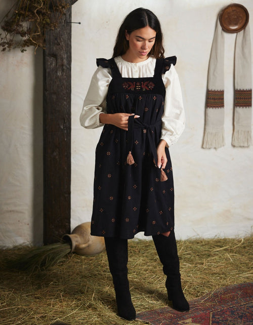 "Alba" pinafore dress with embroidered swans black