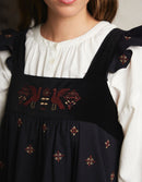 "Alba" pinafore dress with embroidered swans black