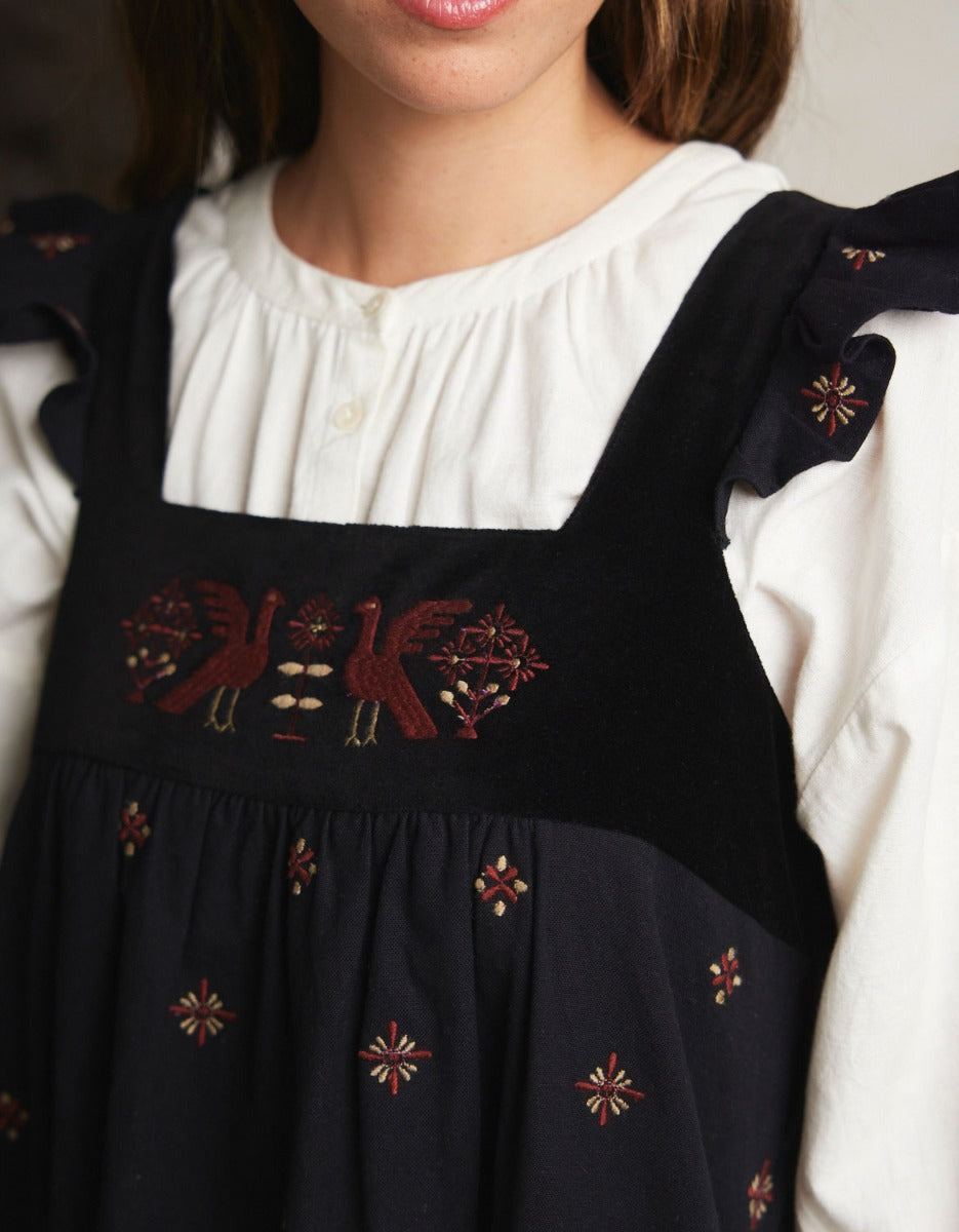 "Alba" pinafore dress with embroidered swans black