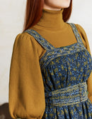 Pull col roulé 'Ariana' en coton et cachemire avec manches gigot moutarde