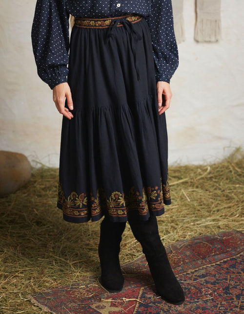 "Astrid" black skirt with contrasting embroideries