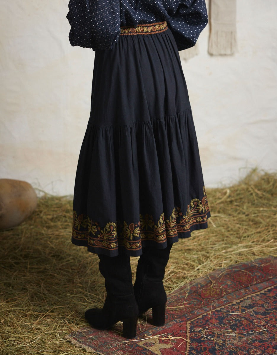 "Astrid" black skirt with contrasting embroideries