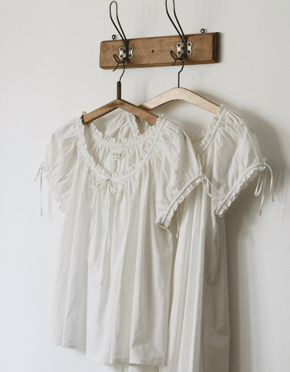 "Cosima" white top with short sleeves