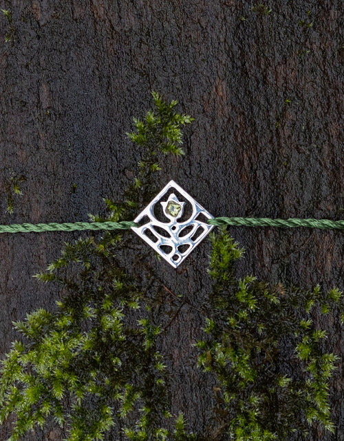 Bracelet 'Primula major' en argent et péridot
