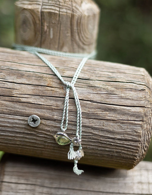 'Volya' silver bird pendant with prasiolite Amethyst and Silk cord